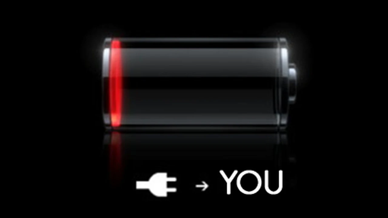 overhead view of corned beef sliced and on a platter with cabbage, potatoes, and carrots